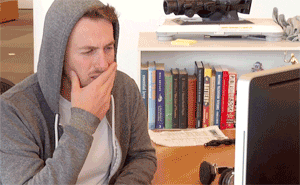 Confused guy at a computer
